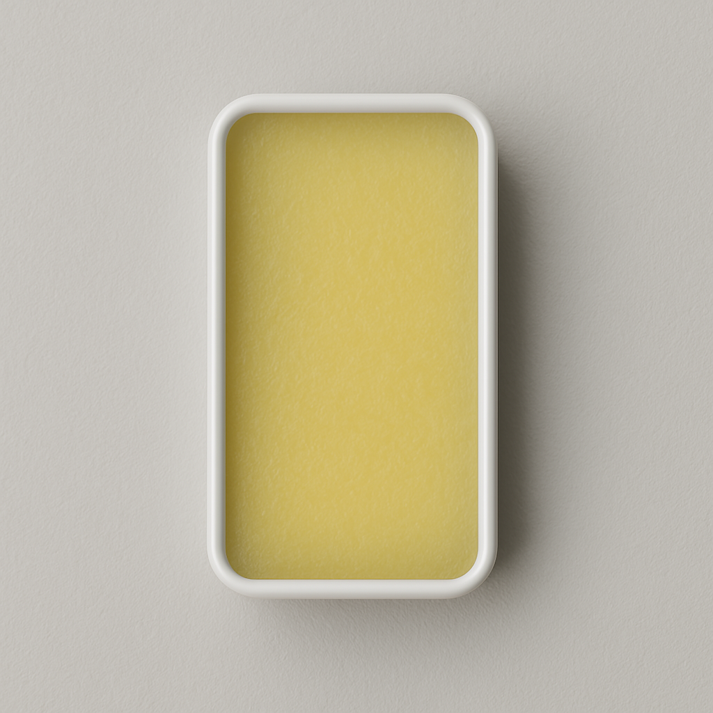 A small, rectangular tin container labeled 'FLOW Solid Cologne' made by civl supply with the text 'Bergamot. Fresh Herbs.